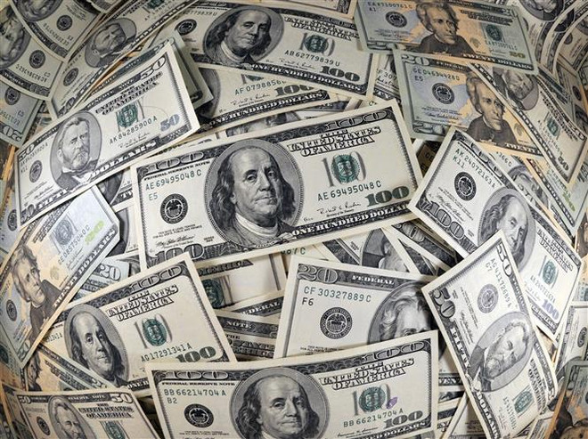 Đồng USD. (Ảnh: AFP/TTXVN) Việt Nam lọt tốp 10 quốc gia nhận kiều hối lớn nhất trên thế giới ảnh 1