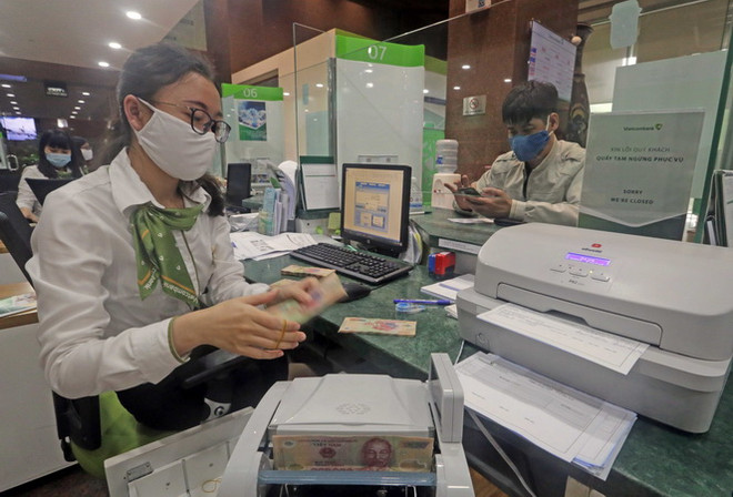 Các ngân hàng tung loạt khuyến mại lì xì khách hàng sau Tết ảnh 1