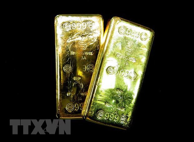 Vàng miếng được bày bán tại một tiệm kim hoàn ở Seoul, Hàn Quốc. (Ảnh: AFP/TTXVN) Giá vàng tại thị trường châu Á phiên 17/2 tiếp tục đi xuống ảnh 1