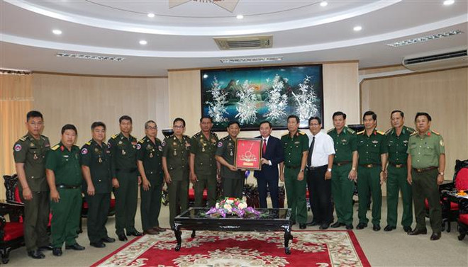 Đoàn công tác của Campuchia thăm, chúc Tết cổ truyền Việt Nam ảnh 1