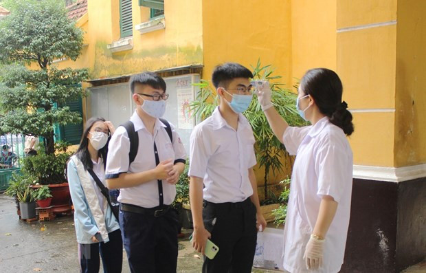 Ảnh chỉ có tính minh họa. (Nguồn: TTXVN) Bình Dương: Từ 1/11, học sinh lớp 12 vùng cấp độ 1 sẽ được đến trường ảnh 1