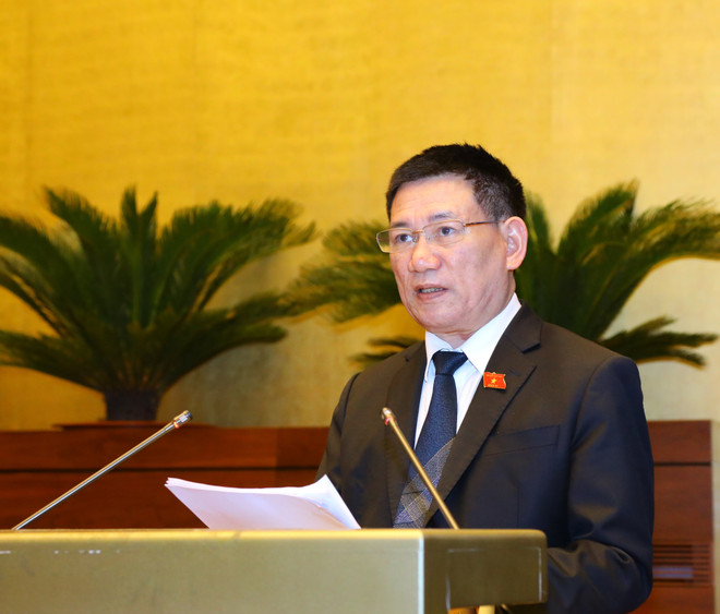 Bộ trưởng Bộ Tài chính Hồ Đức Phớc trình bày Báo cáo đánh giá tình hình thực hiện ngân sách nhà nước năm 2021, dự toán ngân sách nhà nước, phương án phân bổ ngân sách trung ương năm 2022 và Kế hoạch tài chính – ngân sách nhà nước 03 năm 2022-2024. (Ảnh: Văn Điệp/TTXVN) Đưa đất nước tiến lên trên con đường đổi mới, hội nhập và phát triển ảnh 5