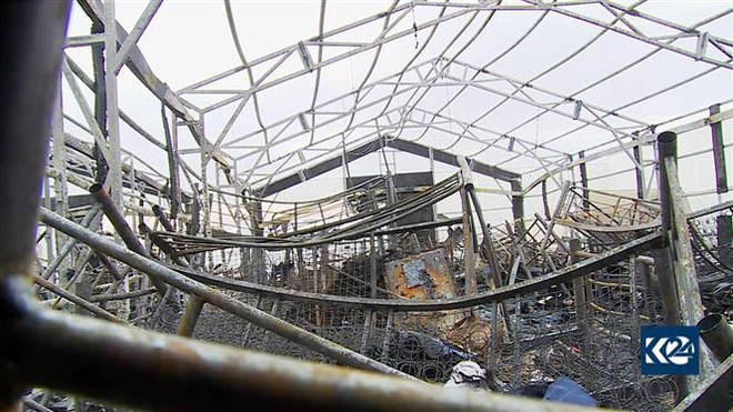 Cảnh tàn phá sau vụ tấn công bằng rocket nhằm vào một căn cứ quân sự ở sân bay Arbil, Iraq, ngày 17/2. (Ảnh: AFP/TTXVN) Iraq: Phiến quân áp dụng chiến lược mới tấn công binh lính Mỹ ảnh 1