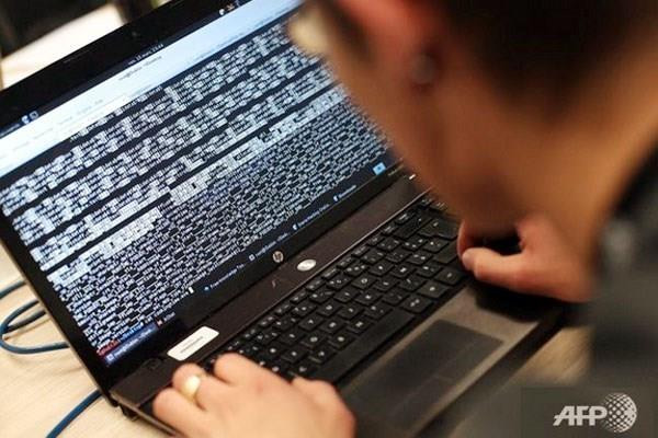 VNCERT ghi nhận có 4.770 sự cố tấn công mạng vào các trang web của Việt Nam. trong quý 1. (Nguồn: AFP) Hơn 4.700 sự cố tấn công mạng vào các trang web của Việt Nam ảnh 1