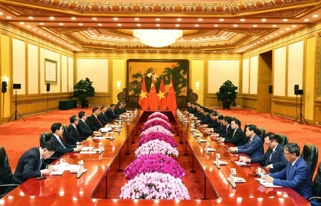 Thủ tướng Nguyễn Xuân Phúc hội kiến Tổng Bí thư, Chủ tịch nước Trung Quốc Tập Cận Bình. (Ảnh: Thống Nhất/TTXVN) Thủ tướng Nguyễn Xuân Phúc hội kiến Chủ tịch Trung Quốc Tập Cận Bình ảnh 1