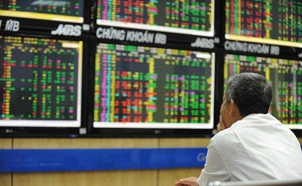 Ảnh minh họa. (Nguồn: Reuters) Thị trường chứng khoán Việt Nam giảm điểm phiên mở cửa sáng 27/3 ảnh 1