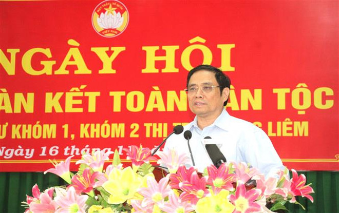 Trưởng ban Tổ chức Trung ương Phạm Minh Chính phát biểu trong Ngày hội. (Ảnh: Lê Thúy Hằng/TTXVN) Trưởng Ban Tổ chức Trung ương dự Ngày hội Đại đoàn kết tại Vĩnh Long ảnh 1