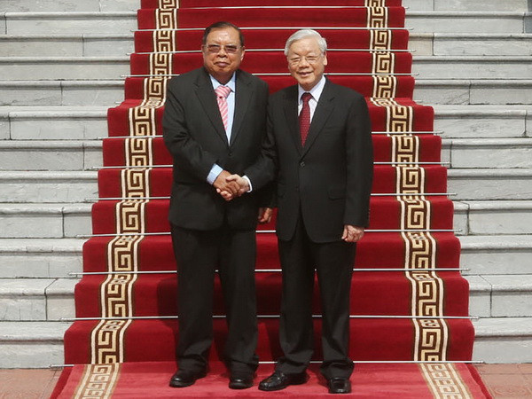 Tổng Bí thư, Chủ tịch nước Lào kết thúc tốt đẹp chuyến thăm Việt Nam ảnh 1