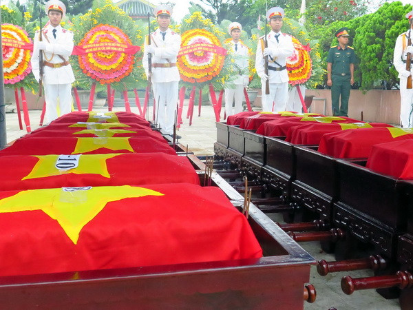 Bàn giao, tiễn đưa hài cốt quân tình nguyện và chuyên gia Việt ở Lào ảnh 1