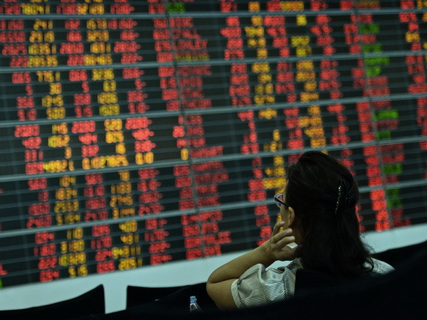 Chứng khoán Trung Quốc giảm điểm gây hiệu ứng toàn cầu ảnh 1