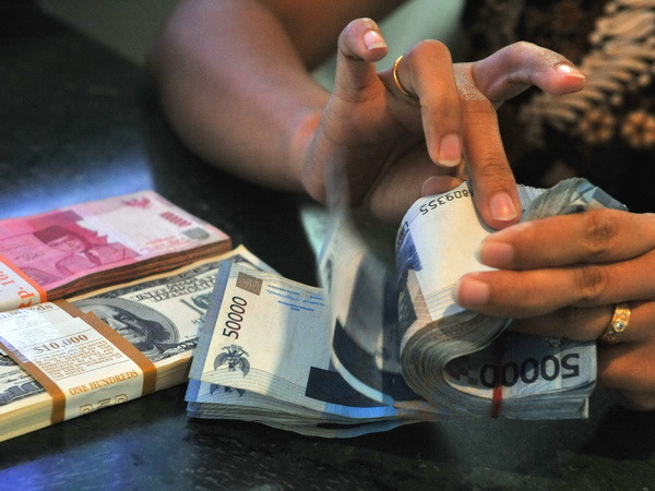Indonesia tiếp tục chính sách thắt chặt tiền tệ trong năm 2015 ảnh 1