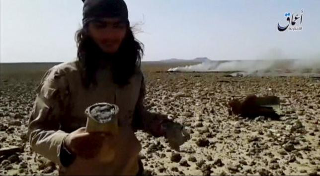 Amaq: IS bắt sống viên phi công quân chính phủ Syria lái Mig-23 ảnh 1