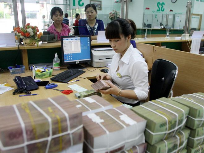 Phấn đấu đến cuối năm 2015 đưa tỷ lệ nợ xấu dưới 3% ảnh 1