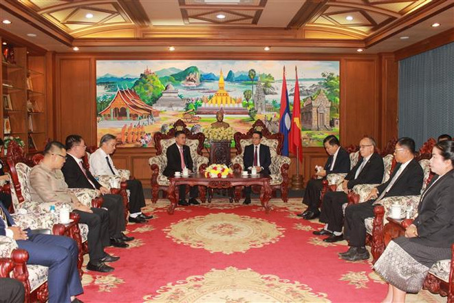 Tổng Lãnh sự quán Việt Nam tại Pakse chúc mừng 47 năm Quốc khánh Lào ảnh 2