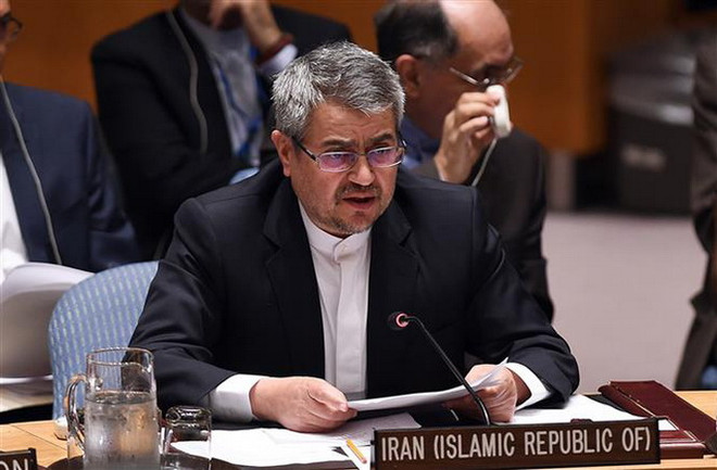 Đại sứ Iran tại Liên hợp quốc Gholamali Khoshroo. (Ảnh: AFP/TTXVN) Iran hối thúc cộng đồng quốc tế lên án lệnh trừng phạt của Mỹ ảnh 1