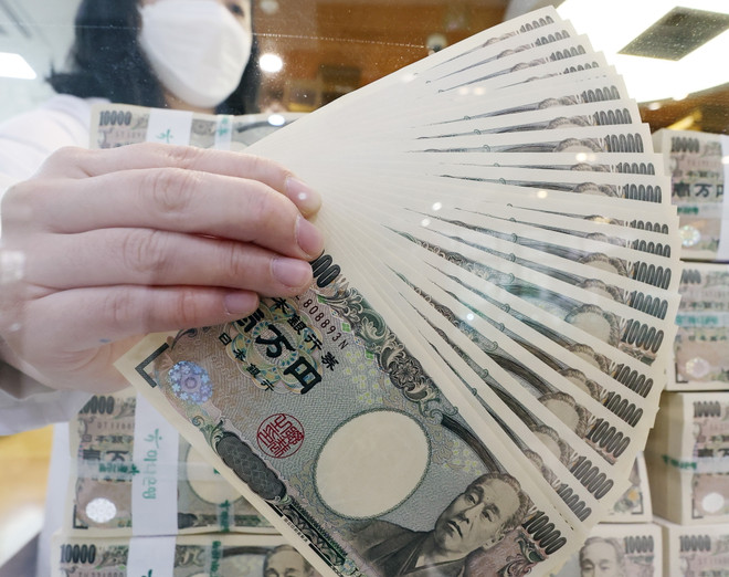 Đồng nội tệ lao dốc - Thiệt hại và lợi ích cho nền kinh tế Nhật Bản ảnh 1