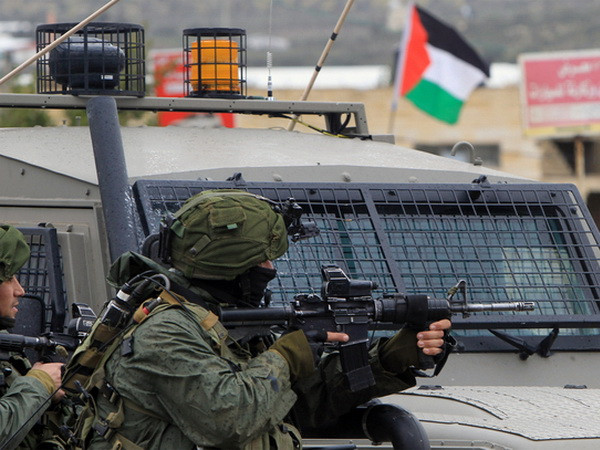 Israel phong tỏa một làng của người Palestine ở khu Bờ Tây ảnh 1