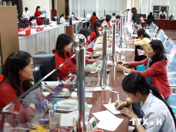 Fitch nâng hạng đánh giá tín nhiệm nợ dài hạn của Việt Nam ảnh 1