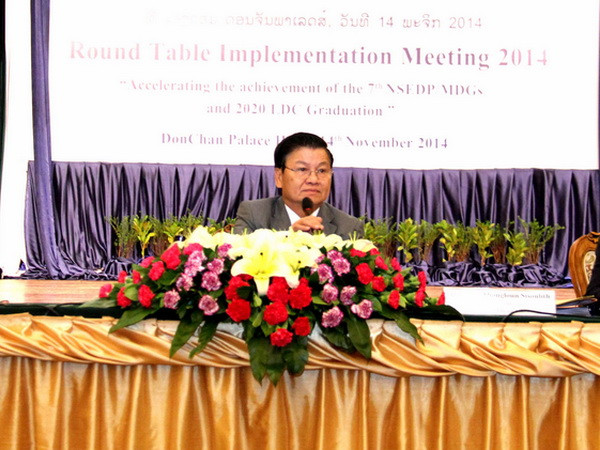 Lào tổ chức Hội nghị bàn tròn về phát triển năm 2014 với UNDP ảnh 1
