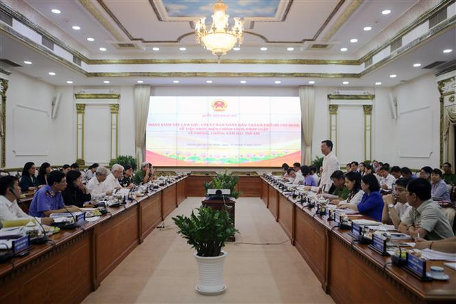 Quang cảnh buổi làm việc. (Ảnh: Thành Chung/TTXVN) Giám sát việc thực hiện phòng, chống xâm hại trẻ em tại TP.HCM ảnh 2