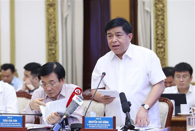 Bộ trưởng Bộ Kế hoạch và Đầu tư Nguyễn Chí Dũng phát biểu. (Ảnh: Dương Giang/TTXVN) Cả nước vì Thành phố Hồ Chí Minh, Thành phố Hồ Chí Minh vì cả nước ảnh 3