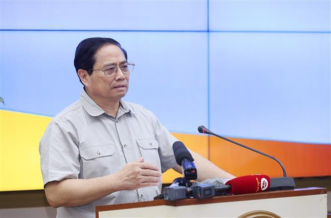 Thủ tướng Phạm Minh Chính kết luận buổi làm việc với Ban Thường vụ Thành ủy Thành phố Hồ Chí Minh. (Ảnh: Dương Giang/TTXVN) Cả nước vì Thành phố Hồ Chí Minh, Thành phố Hồ Chí Minh vì cả nước ảnh 4