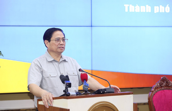 Thủ tướng Phạm Minh Chính phát biểu tại buổi làm việc. (Ảnh: Dương Giang/TTXVN) Cả nước vì Thành phố Hồ Chí Minh, Thành phố Hồ Chí Minh vì cả nước ảnh 1