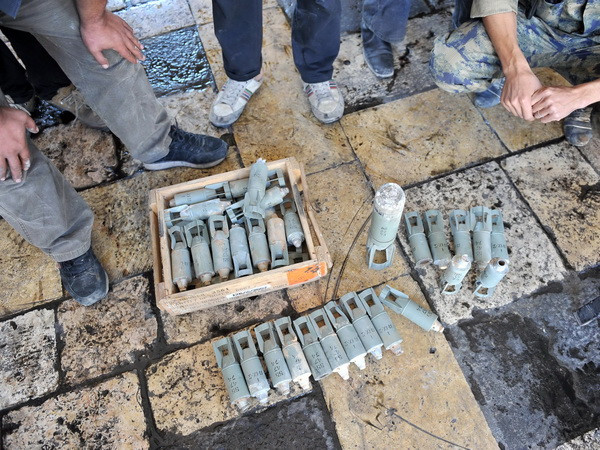 Tổ chức nhân quyền cáo buộc IS sử dụng bom chùm ở Syria ảnh 1