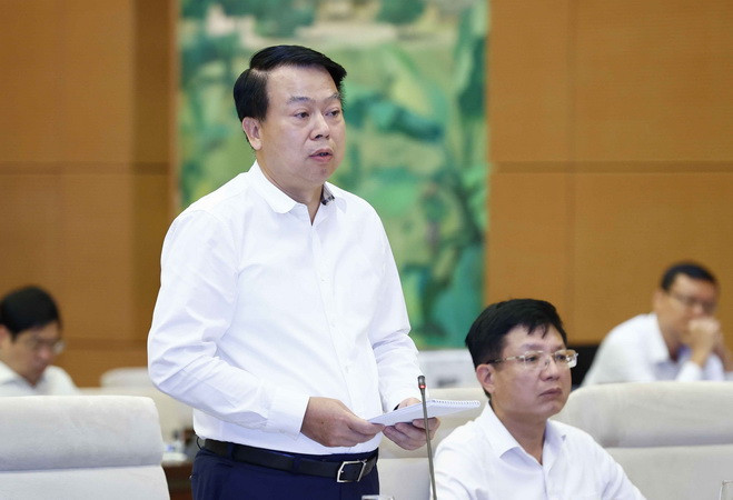 Thứ trưởng Bộ Tài chính Nguyễn Đức Chi phát biểu. (Ảnh: Doãn Tấn/TTXVN) Phó Thủ tướng Lê Minh Khái: Phải phản ứng chính sách nhanh hơn ảnh 2