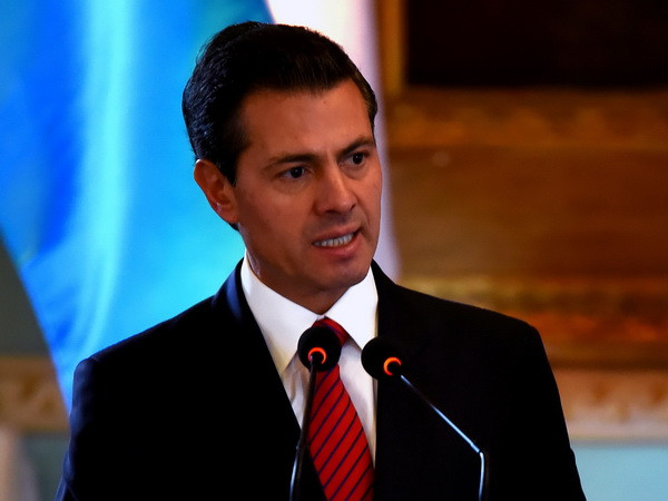 Tổng thống Mexico Enrique Pena Nieto. (Nguồn: AFP/TTXVN) Mexico xem xét lại cơ chế hợp tác của mỗi bộ, ngành với Mỹ ảnh 1