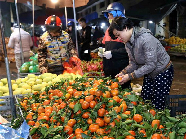 Nguồn cung hàng hóa dồi dào, duy trì ổn định thị trường sau Tết ảnh 4