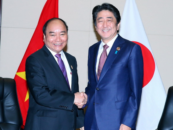 Thủ tướng Nguyễn Xuân Phúc hội kiến Thủ tướng Nhật Bản và New Zealand ảnh 1