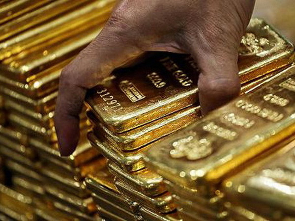 Giá vàng châu Á đi ngang trong phiên đầu tuần khi đồng USD giảm ảnh 1