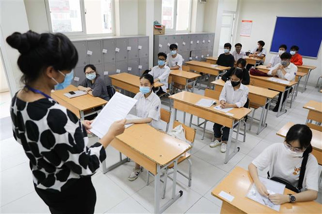 Các thí sinh tham dự kỳ thi tốt nghiệp Trung học Phổ thông đợt 1. (Ảnh: Thanh Tùng/TTXVN) TP.HCM đề xuất xét đặc cách tốt nghiệp THPT cho thí sinh thi đợt 2 ảnh 1