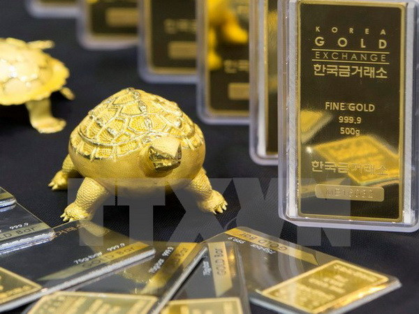 Giá vàng trên thế giới giảm xuống mức thấp nhất trong 2 tuần ảnh 1