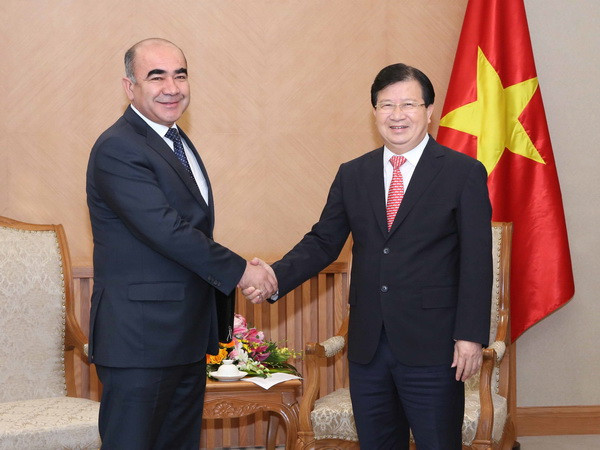 Phó Thủ tướng Trịnh Đình Dũng tiếp Phó Thủ tướng Uzbekistan Mirzaev Zoyir. (Ảnh: Phương Hoa/TTXVN) Việt Nam sẵn sàng mở rộng hợp tác trong mọi lĩnh vực với Uzbekistan ảnh 1