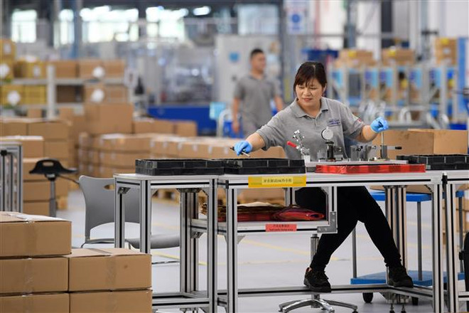 Hoạt động chế tạo của Trung Quốc tăng tháng thứ hai liên tiếp ảnh 1