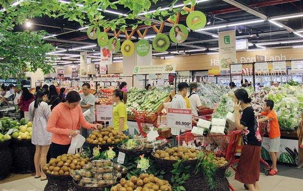Ảnh chỉ có tính minh họa. (Ảnh: Mỹ Phương/TTXVN) Duy trì kiểm soát thị trường 24/24 giúp nhân dân đón Tết an vui ảnh 1