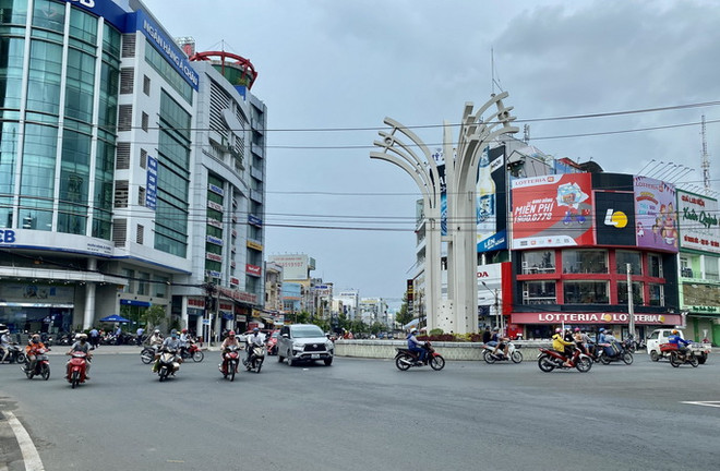 An Giang giảm cấp độ dịch COVID-19 từ vùng cam xuống vùng vàng ảnh 1