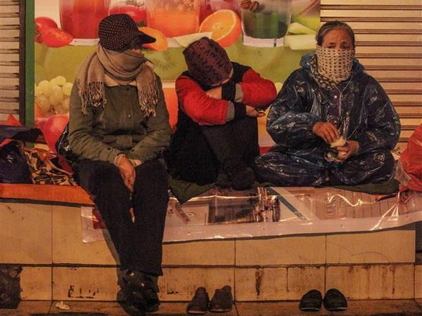 Không khí lạnh tràn xuống Đông Bắc Bộ, gây mưa rào rải rác ảnh 1