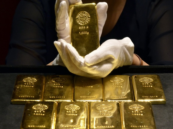 Giá vàng tăng sau quyết định giữ nguyên lãi suất của Fed ảnh 1