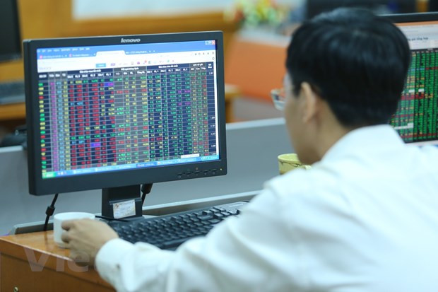 (Ảnh minh họa: PV/Vietnam+) Chứng khoán sáng 13/5 vẫn giảm điểm do hạ lãi suất điều hành ảnh 2