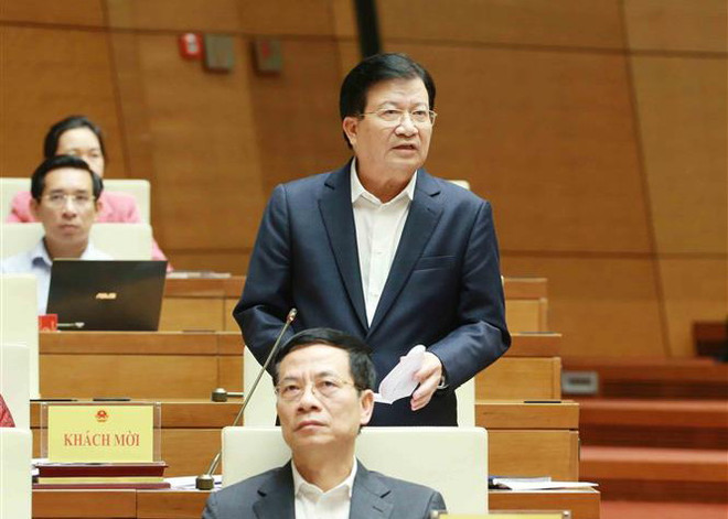 Ba Phó Thủ tướng và các tư lệnh ngành trả lời chất vấn trước Quốc hội ảnh 4