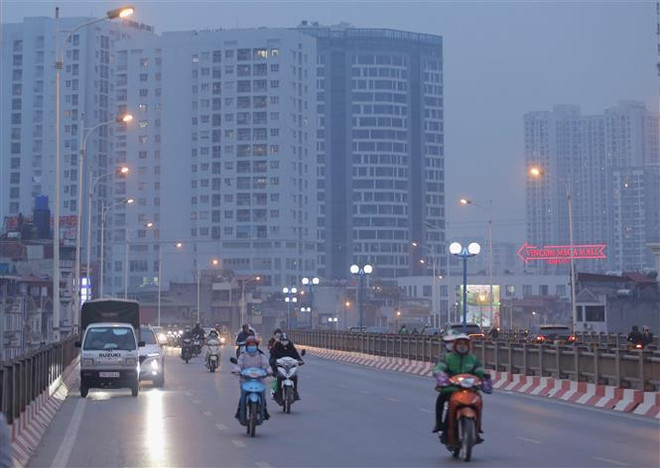 Bắc Bộ có mưa nhỏ vài nơi, sáng sớm có sương mù. (Ảnh: Hoàng Hiếu/TTXVN) Khu vực Bắc Bộ có mưa nhỏ vài nơi, sương mù, trưa chiều trời nắng ảnh 1
