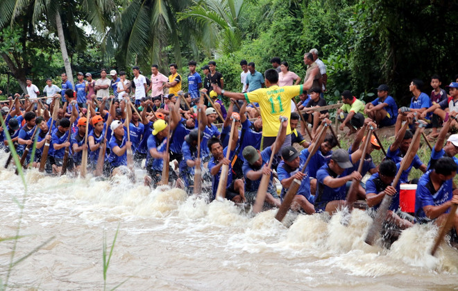 ttxvn_dua ghe ngo.jpg