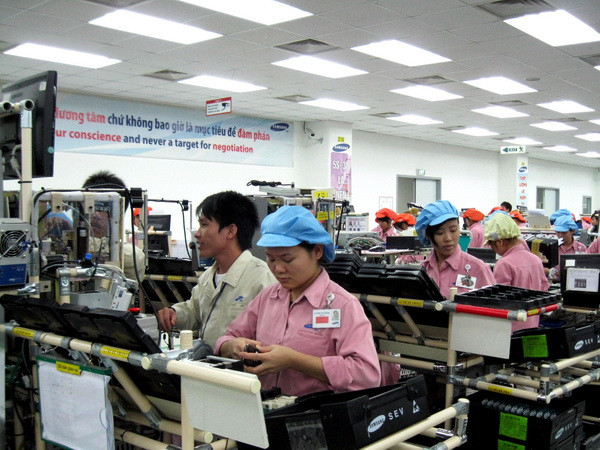 EIU giữ nguyên dự báo tích cực về tăng trưởng kinh tế Việt Nam ảnh 1