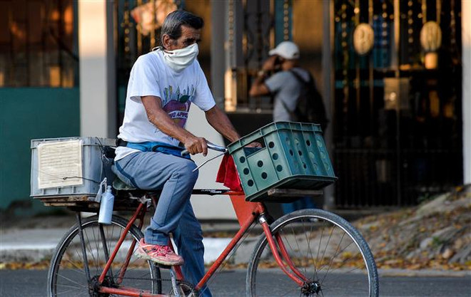 Dịch bệnh COVID-19 lây lan mạnh ở cả châu Âu, châu Mỹ và châu Á ảnh 2