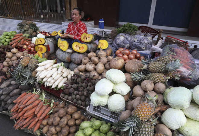 [Photo] Chợ đêm nông sản dịp giáp Tết Nguyên đán tại Hậu Giang ảnh 10
