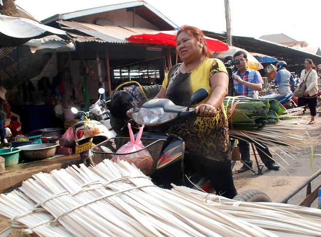 [Photo] Vientiane sôi động đón tết cổ truyền của người Việt ảnh 6