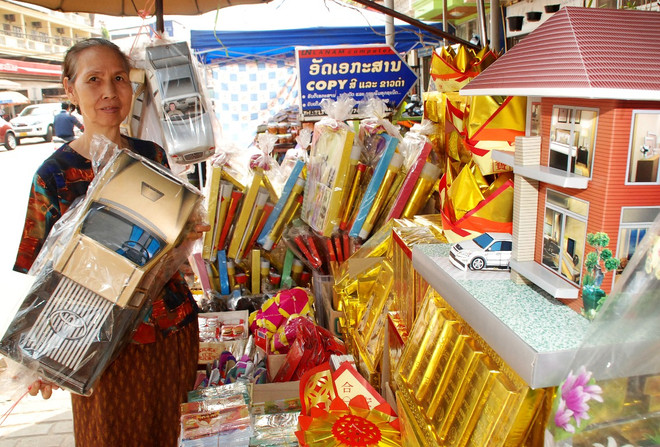 [Photo] Vientiane sôi động đón tết cổ truyền của người Việt ảnh 13